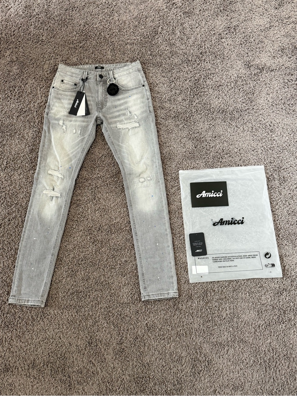 Grey paint splatter skinny jeans size 28
